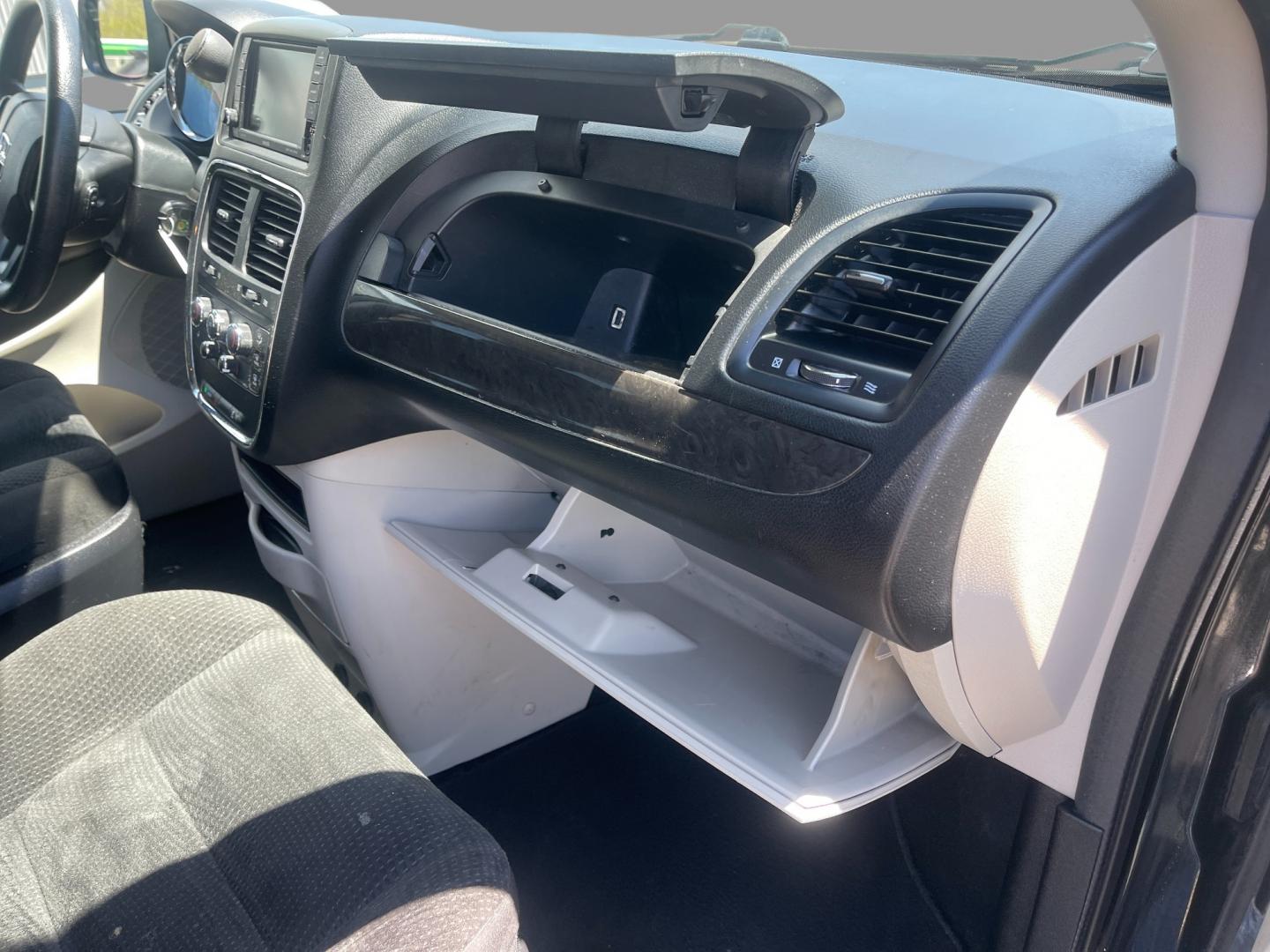 2019 Black /Black Dodge Grand Caravan SE (2C4RDGBG6KR) with an 3.6L V6 DOHC 24V engine, 6A transmission, located at 547 E. Main St., Orwell, OH, 44076, (440) 437-5893, 41.535435, -80.847855 - This 2019 Dodge Grand Caravan SE presents a practical and spacious option for families or travelers needing room for seven passengers. Powered by the robust 3.6L Pentastar V6 engine paired with a 6-speed automatic transmission, it delivers a smooth and reliable driving experience. This model boasts - Photo#35